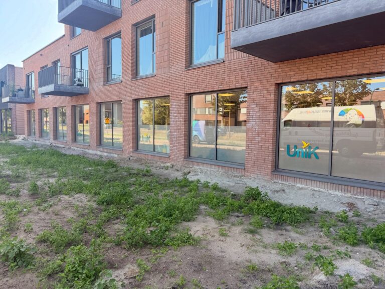 Photo by Philipse Reclame on August 24, 2026. May be an image of brick wall, buildings, window and text.